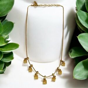 Napier Gold Tone Necklace with Decorative Floral Charms